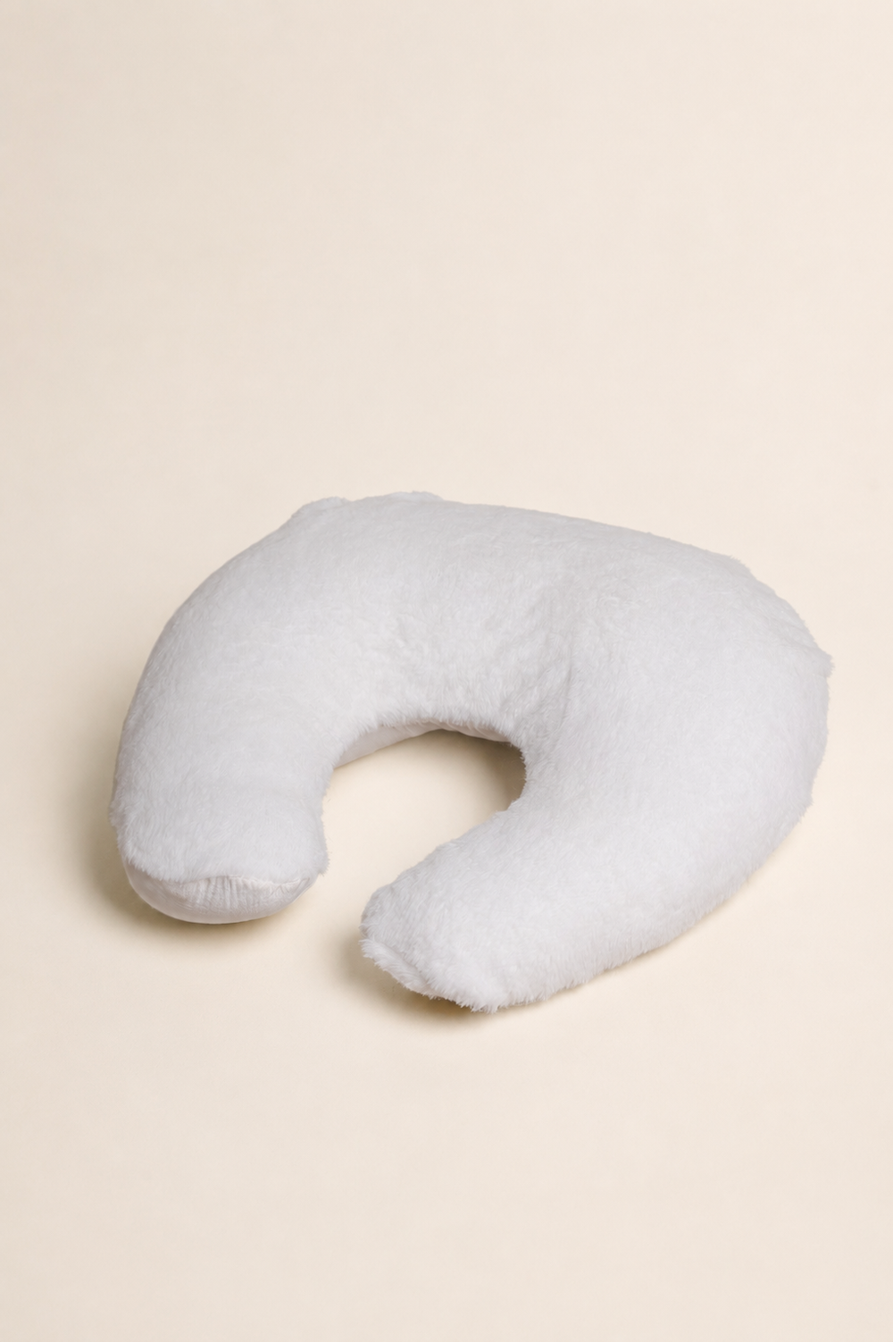Feeding Pillow, plush fur, handcrafted in Kerala – front view